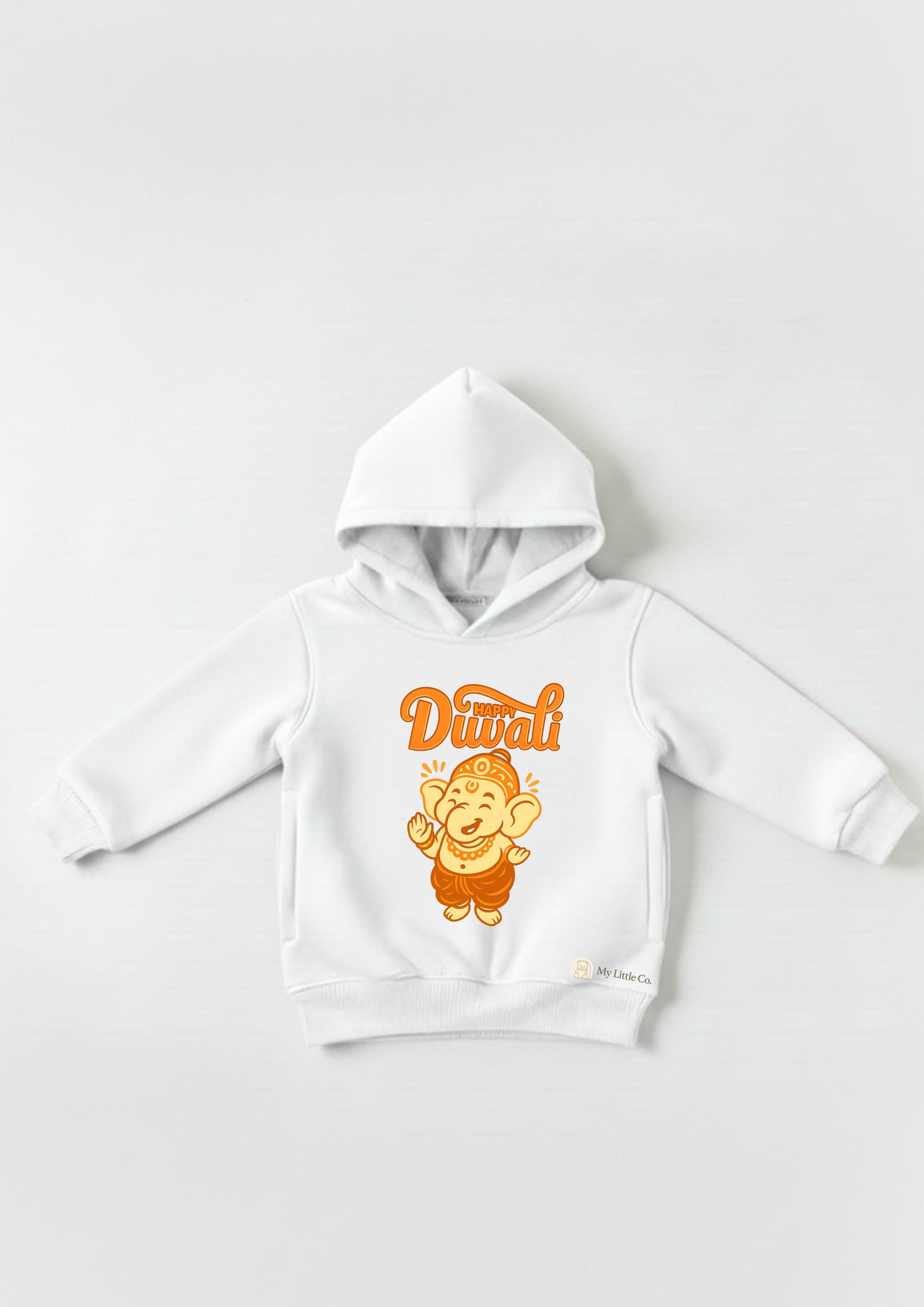 Close-up of vibrant Ganesha DTF print standing out on the white cotton fleece.