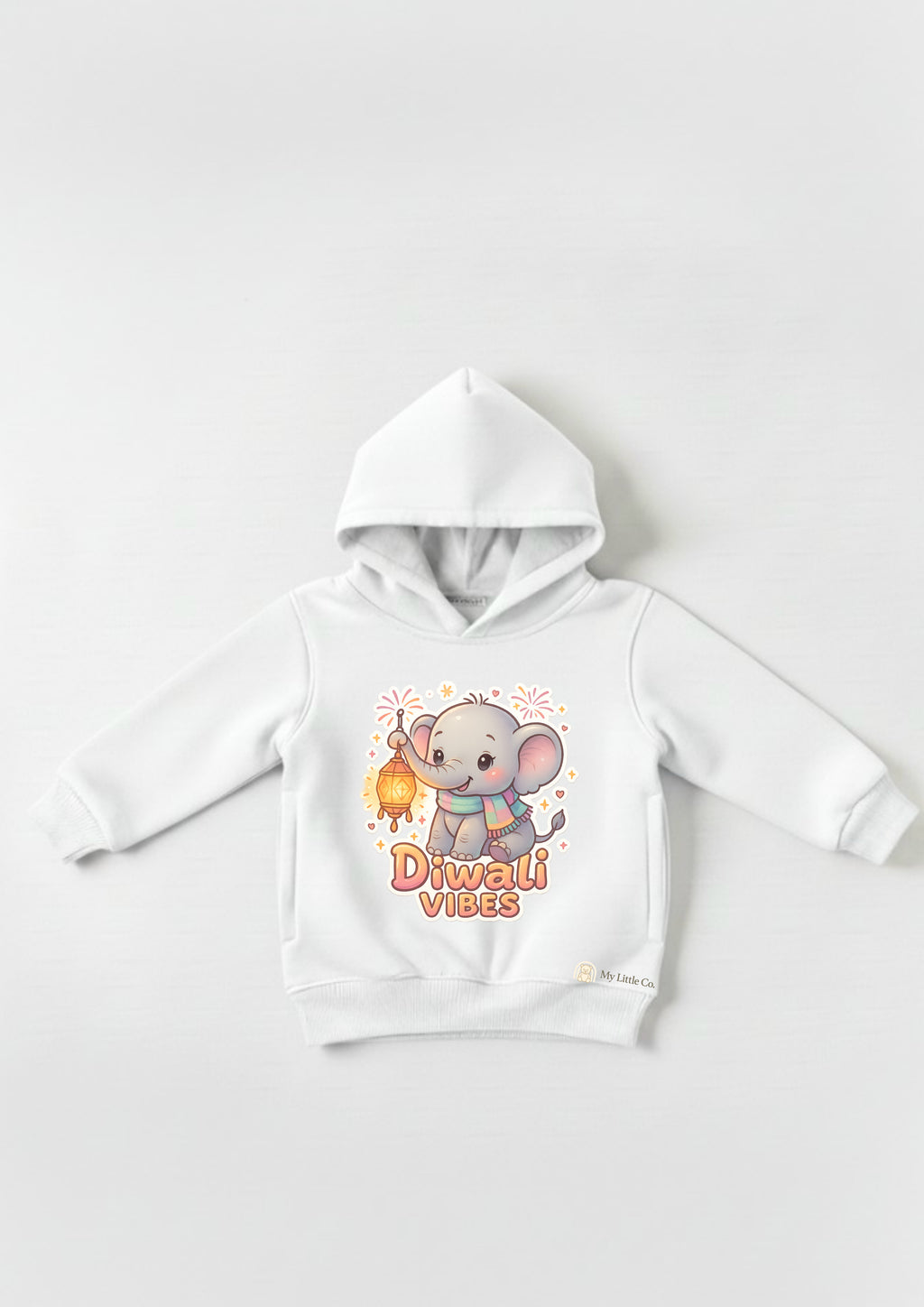 Close-up of vibrant cartoon elephant DTF print on pristine white cotton fleece.