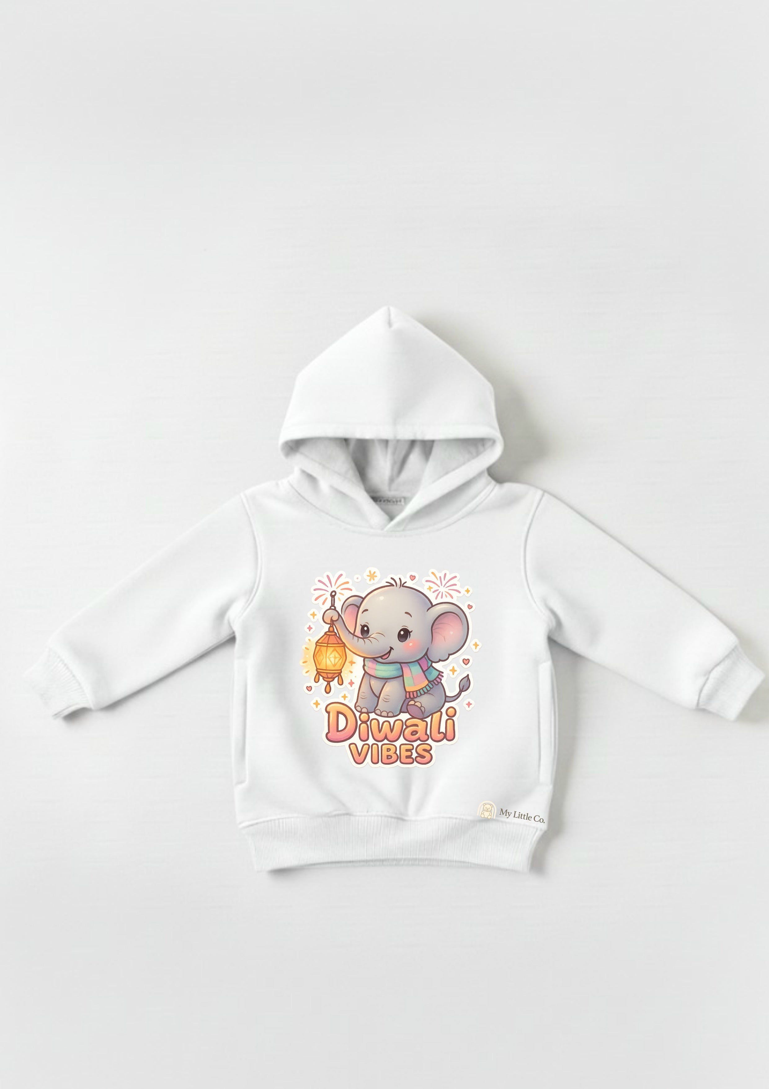 Close-up of vibrant cartoon elephant DTF print on pristine white cotton fleece.