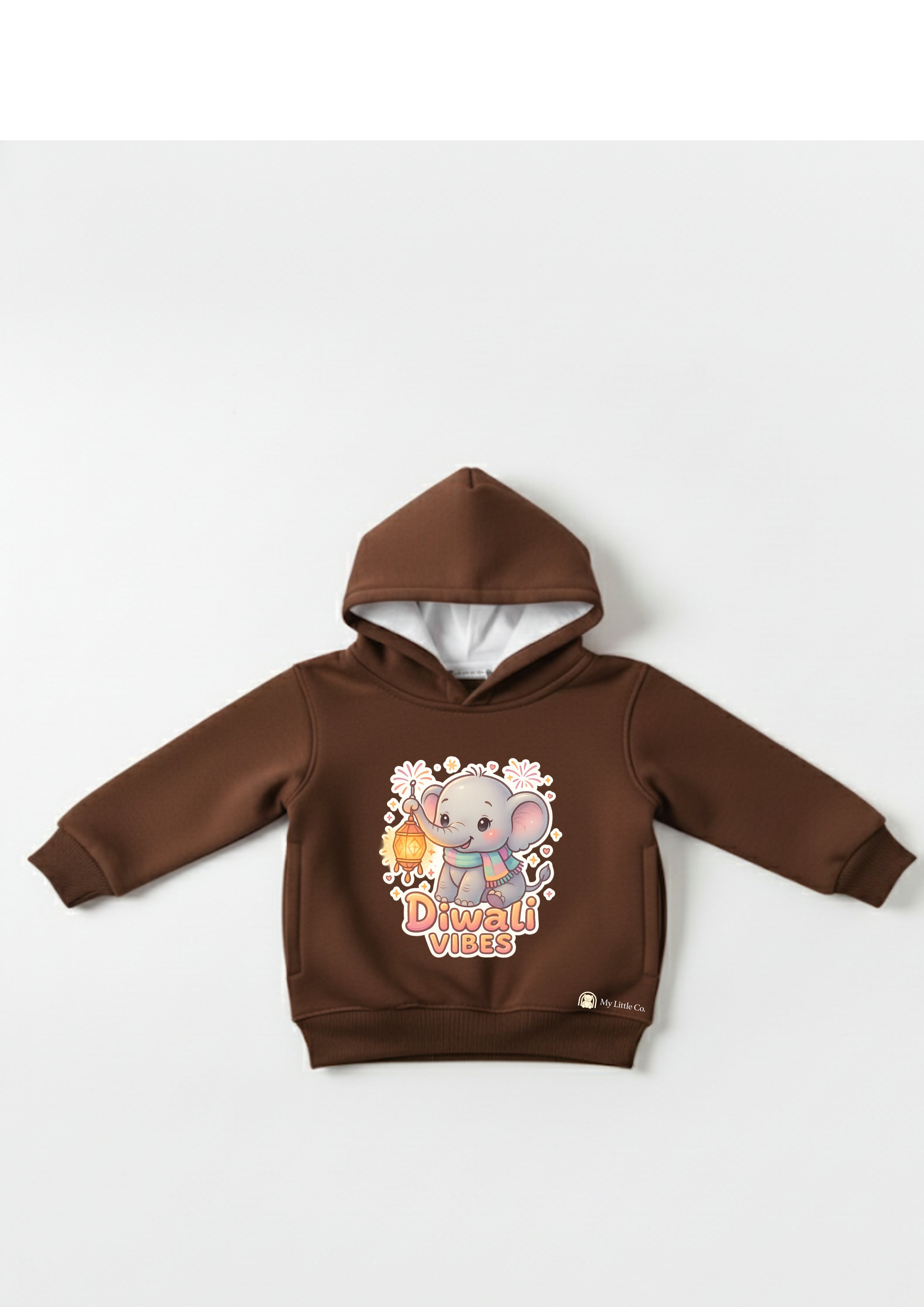 Close-up of vibrant cartoon elephant DTF print on rich brown cotton fleece.