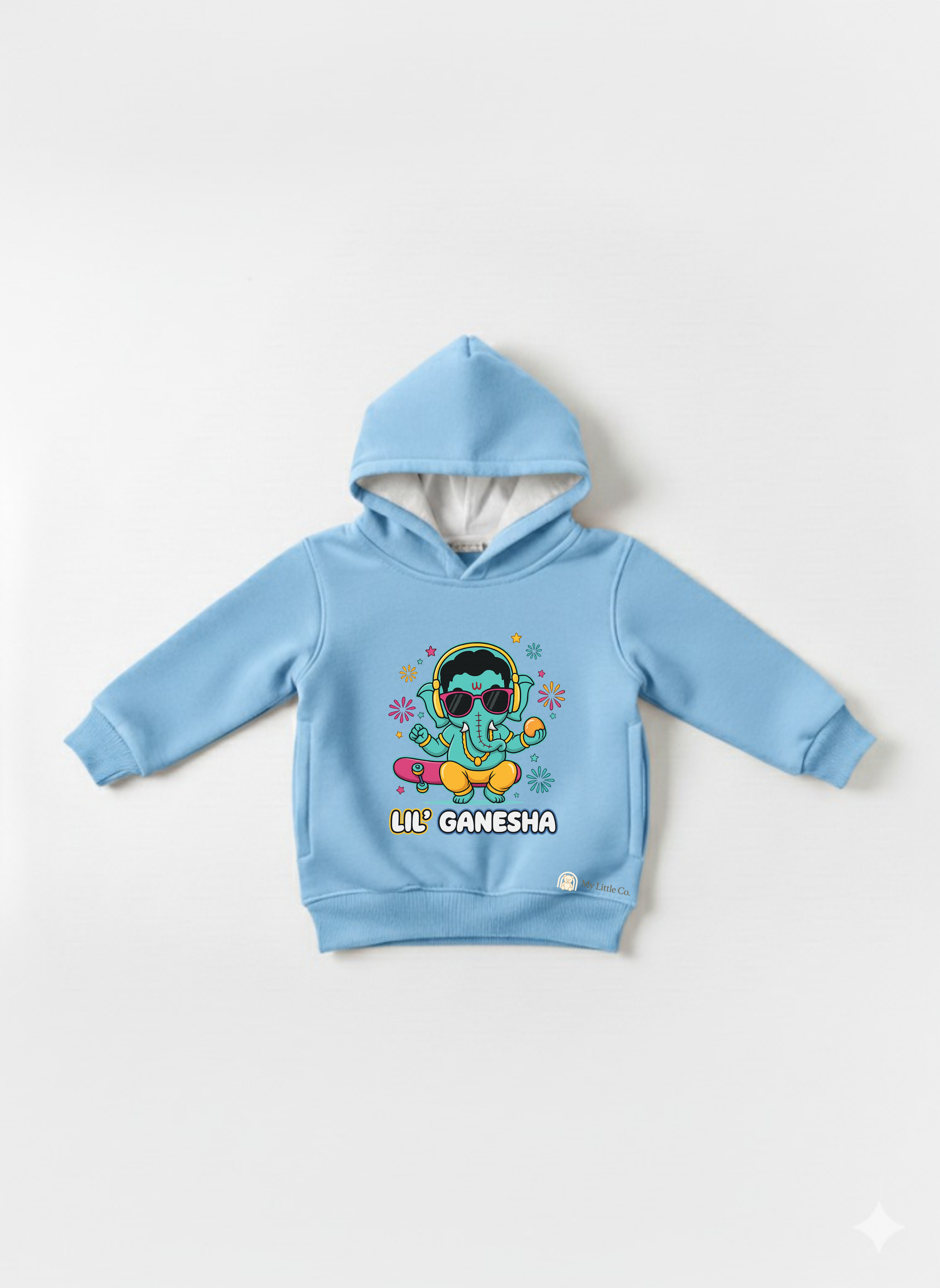 Close-up of vibrant cool Ganesha DTF graphic with headphones on sky blue fabric.