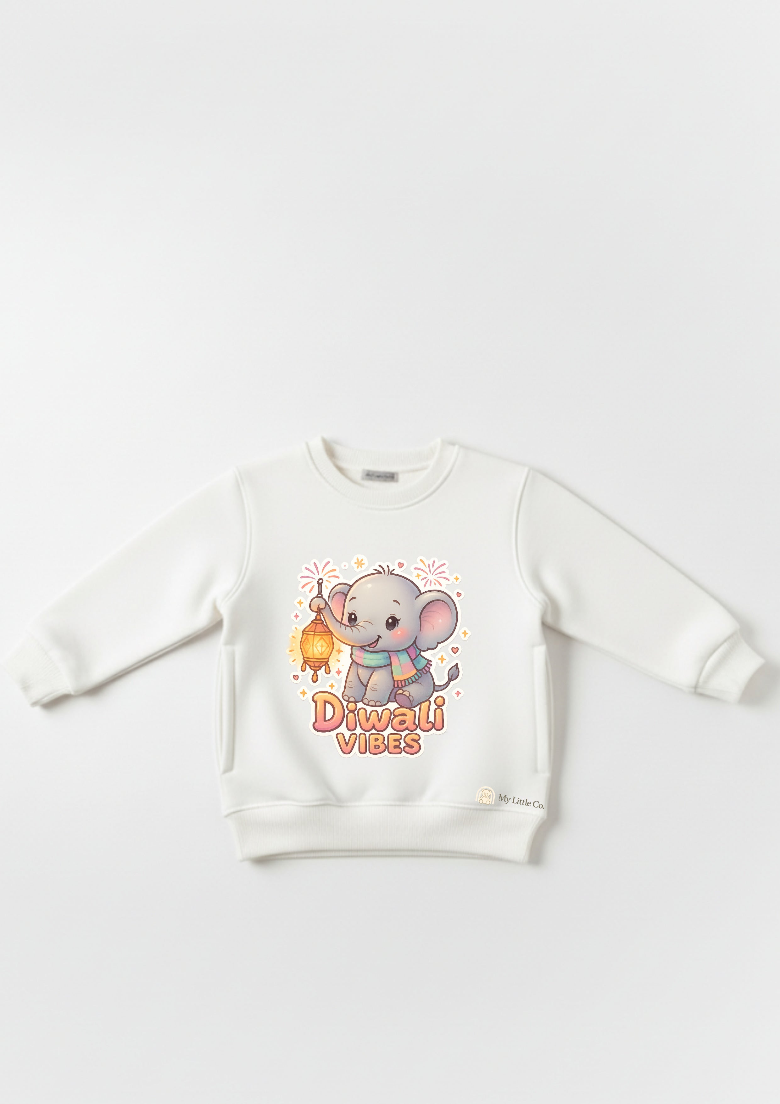 Photo-ready White Elephant Diwali Vibes sweater for childhood memories.