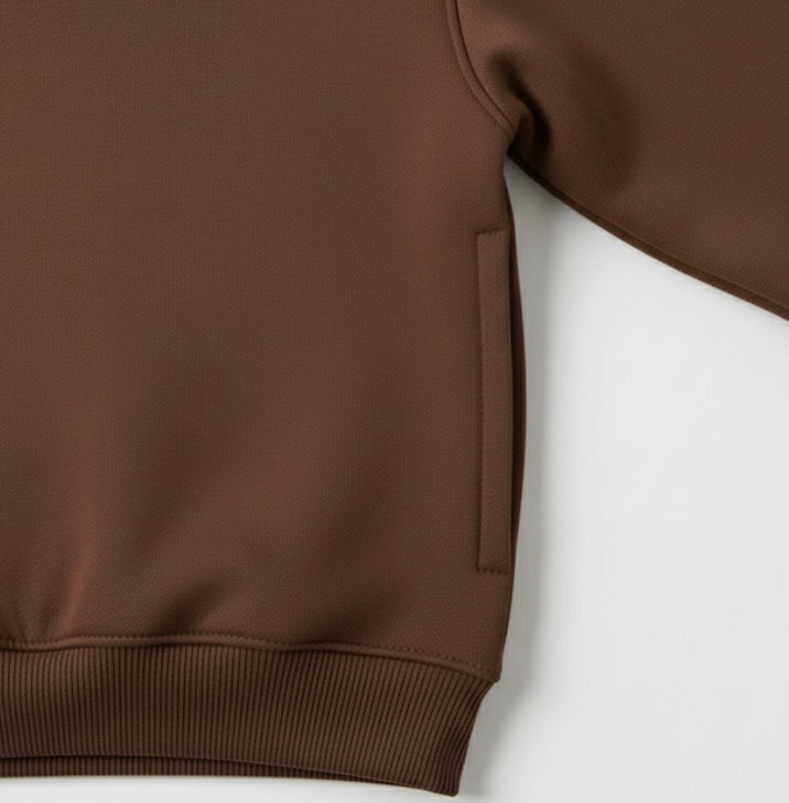 Unisex toddler wearing coffee brown crew neck sweatshirt with Ganesha print. Warm anti-pill fabric.