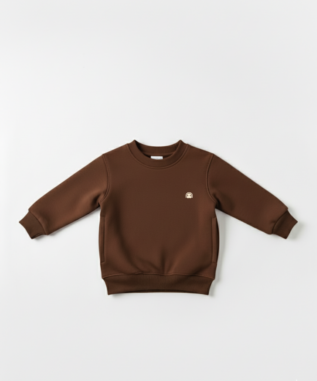 Brown sweatshirt with a small logo on a white background